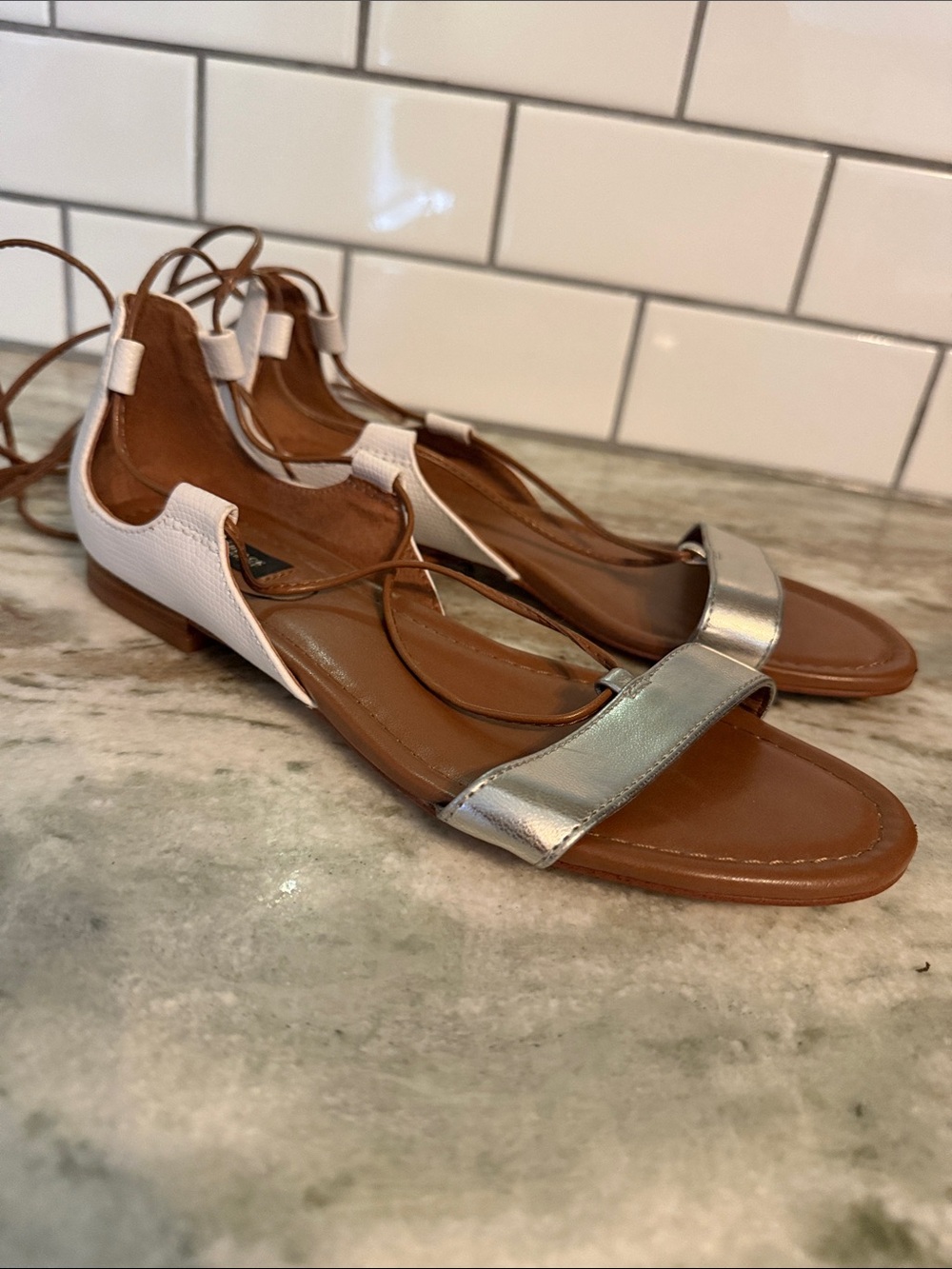 White House black market Metallic Silver and White Lace-Up Flat Sandals